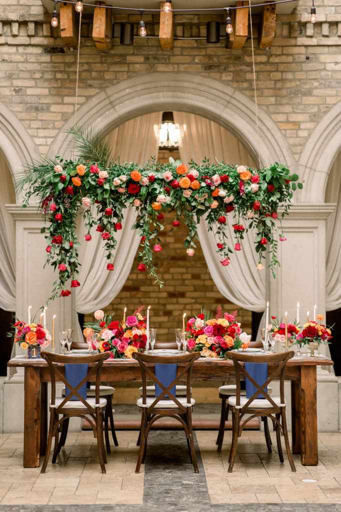 An outdoor wedding tablescape designed by a Toronto wedding planner